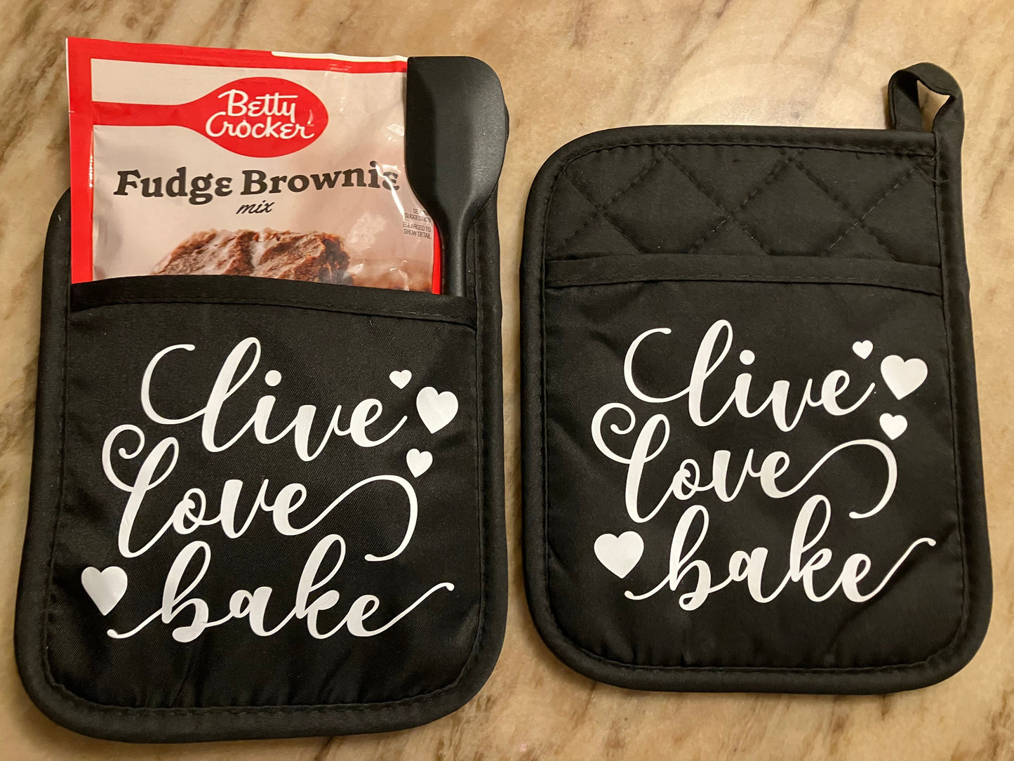 Live Love Bake Gift Set, with Message in White on 2 Black Pot Holder, 1 Dessert Mix & 1 Spatula or Spoon